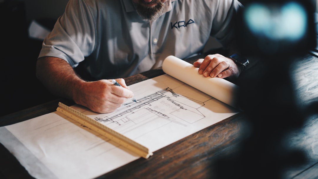 Architect reviewing construction drawings