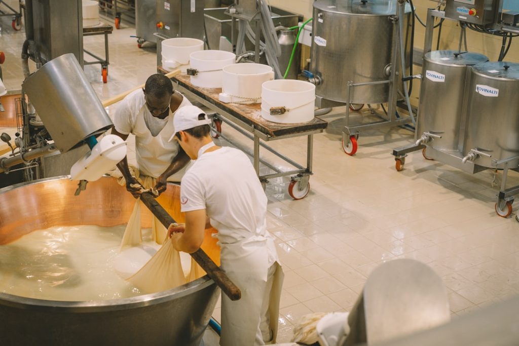 Clean industrial food processing environment with workers in a factory