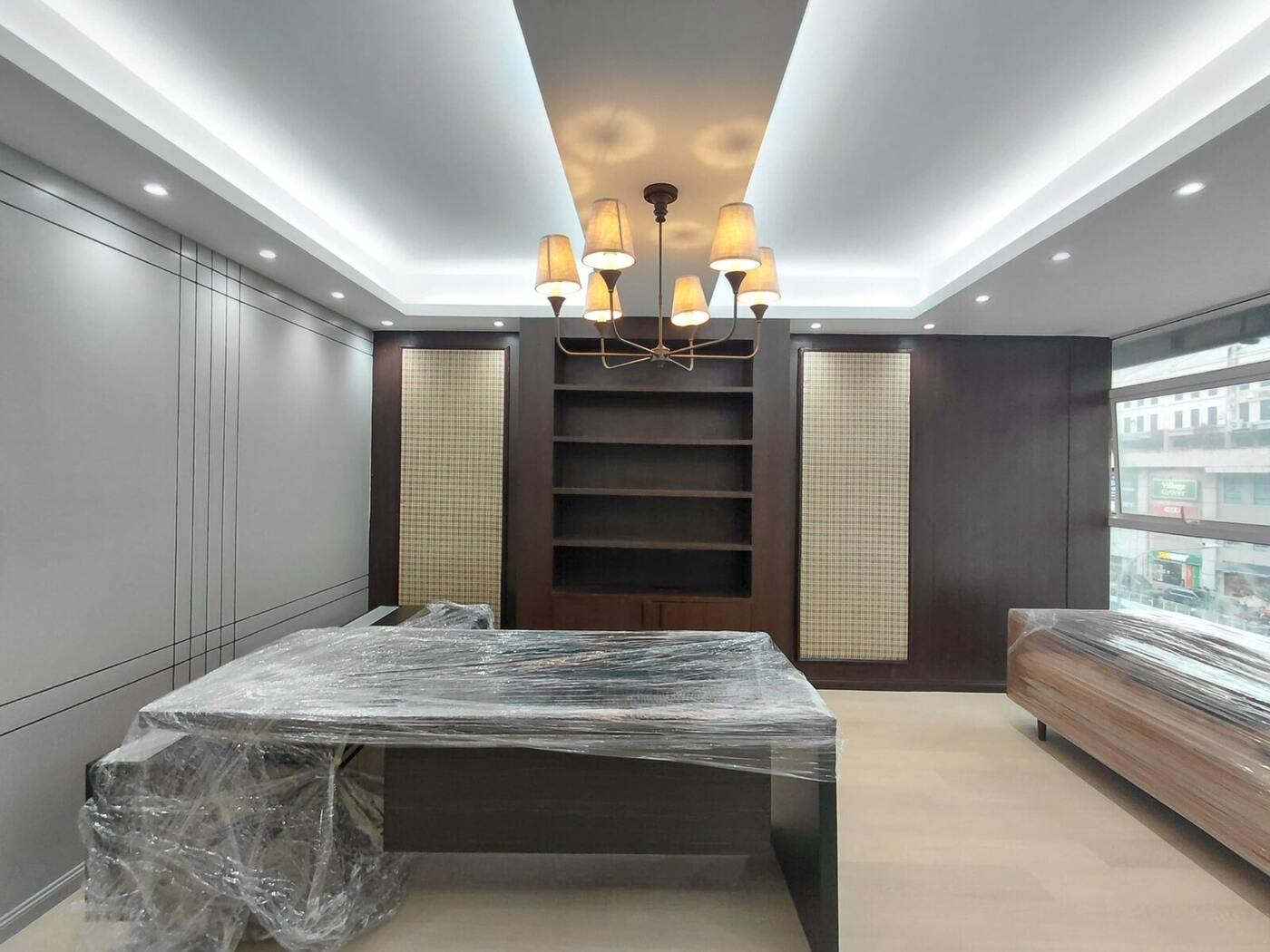 Executive director room with custom built-in cabinetry, feature lighting and timber office furniture