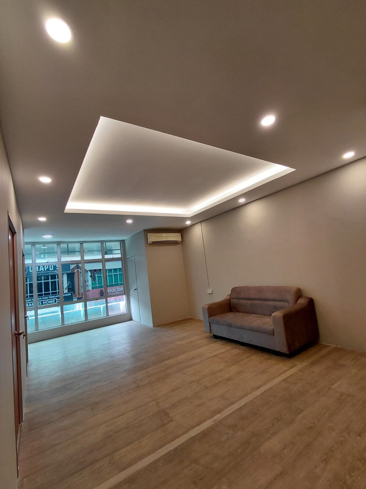 SPA Bangi reception and waiting area with feature plaster ceiling by Fata Bestari