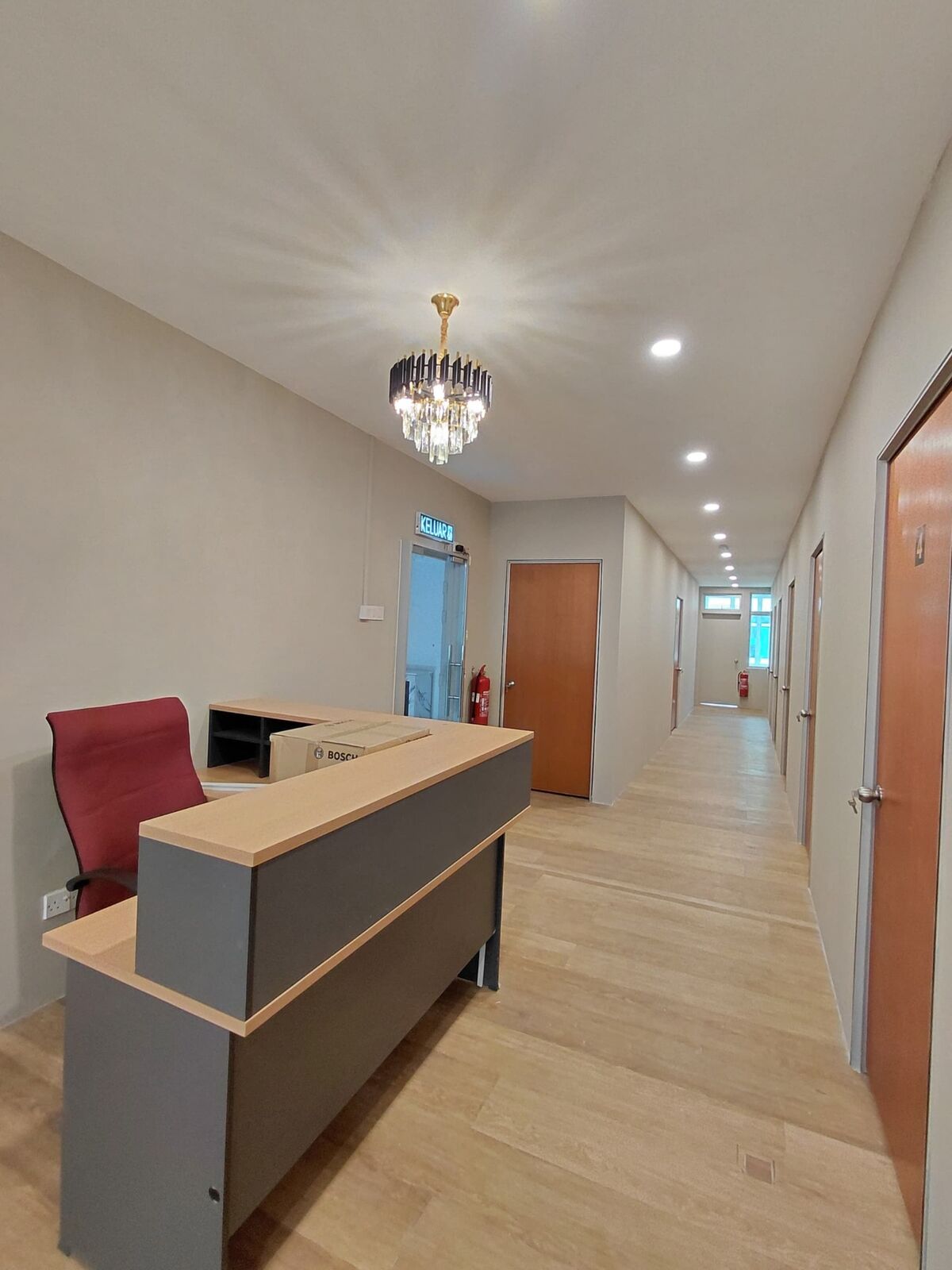 SPA Bangi reception counter and treatment-room corridor interior fit-out